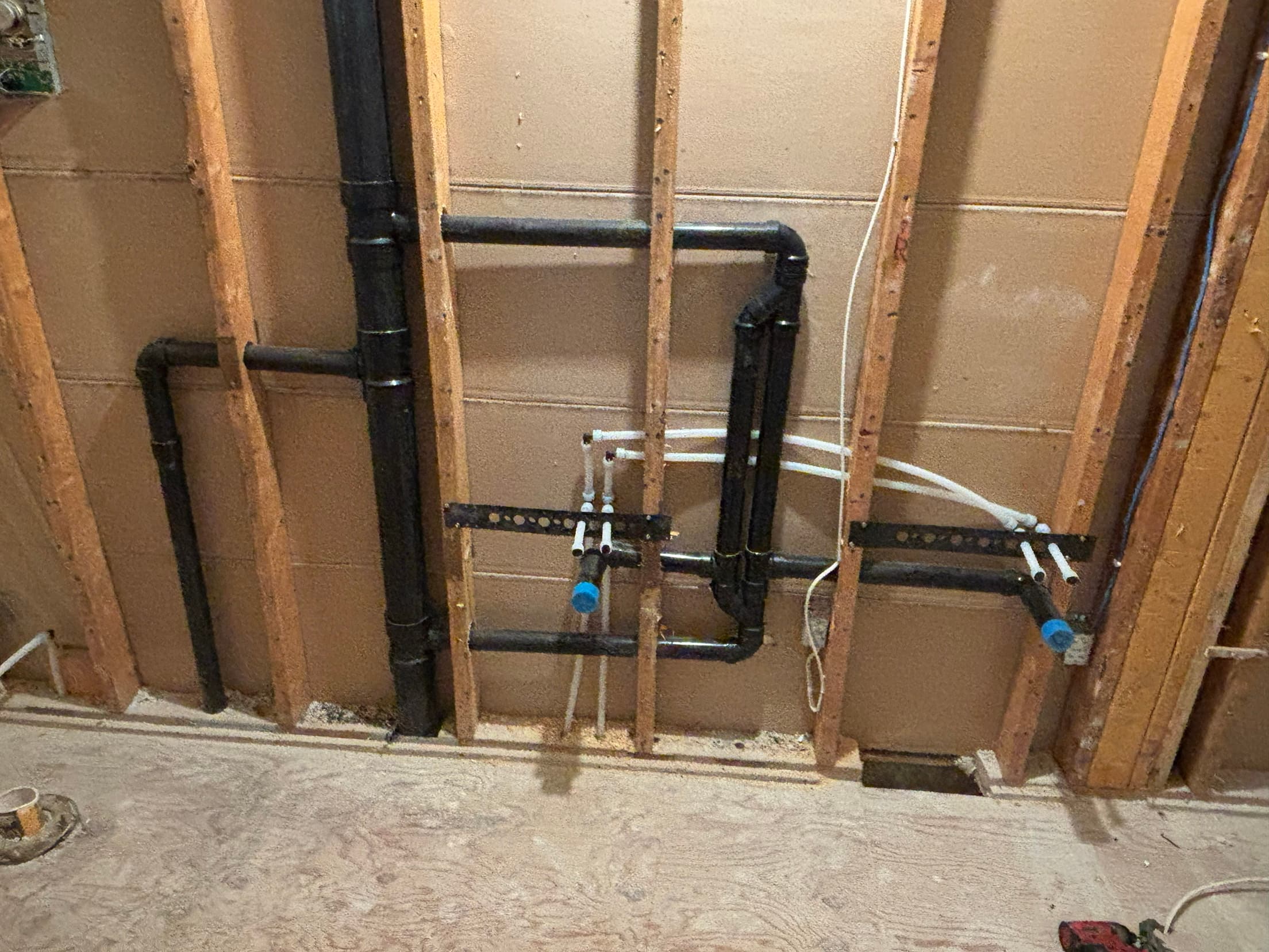 Bathroom renovation rough-in with new drains and PEX supply by ARD Plumbing