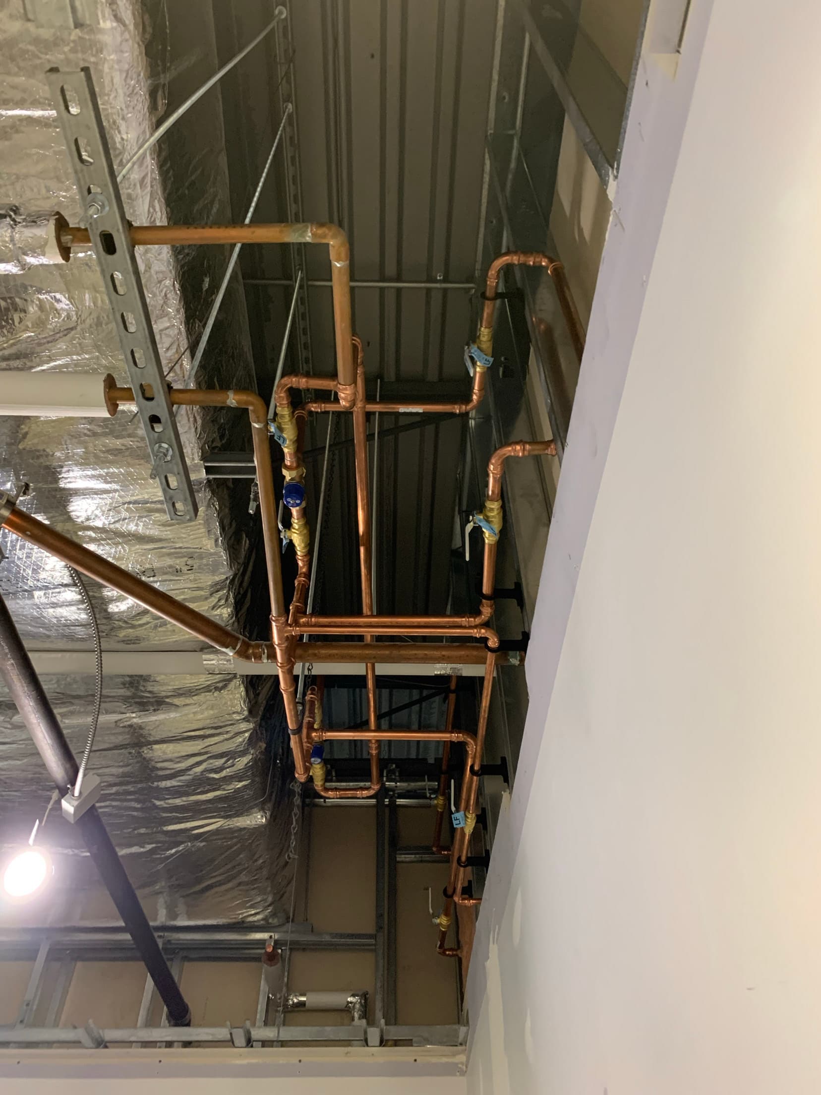 Overhead copper supply mains installed by ARD Plumbing